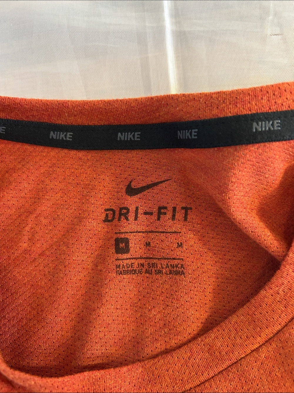 Nike Men’s Short-Sleeve Crew Tee in Burnt Orange with Black Swoosh - Picture 2 of 9